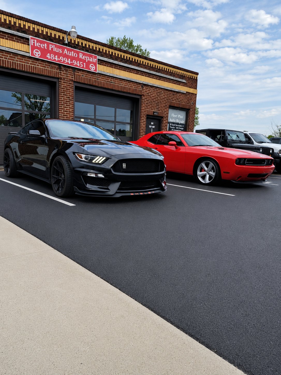 Vehicles in the Fleet Plus Auto Repair lot